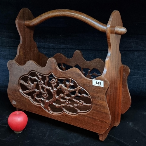 148 - A fab vintage hand carved wooden magazine rack featuring curved edges and a pierced centre that form... 