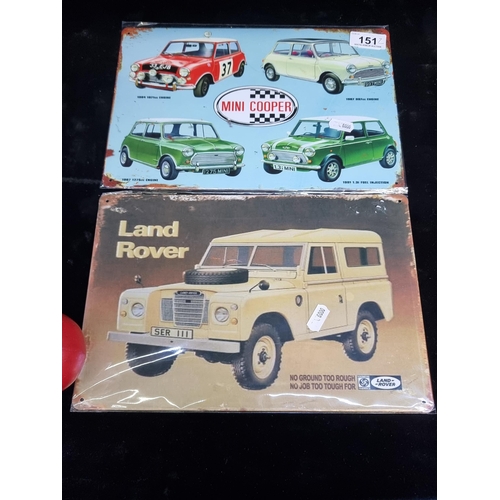 151 - A pair of  printed metal advertising signs for Land Rover and Mini Cooper.