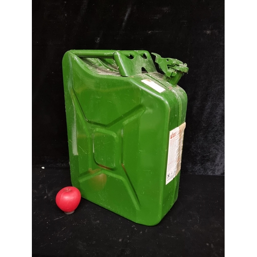 243 - A large green metal Jerry can, unused. Price sticker