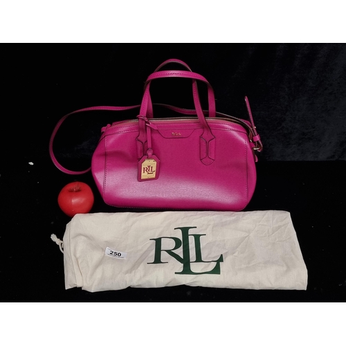 250 - A gorgeous designer Lauren by Ralph Lauren hand bag / cross body bag in a vibrant fuchsia pink. With... 