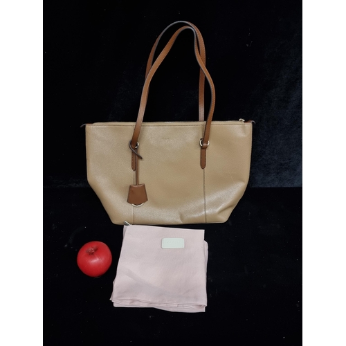 262 - A Radley London ladies tan leather handbag. RRP for similar models on website £199+ with original du... 