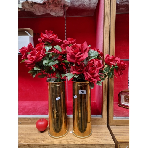 279 - A vintage pair of nice heavy tall vases made artillery military shell casings. Both dating to 1979 t... 