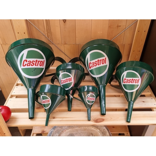 294 - A set of very cool six Castrol Oil branded metal funnels in a deep green painted finish.