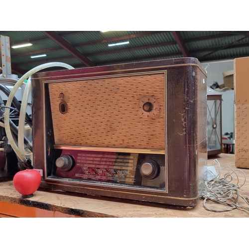 297 - A fantastic PYE antique wood encased radio with original dials and in good vintage condition.