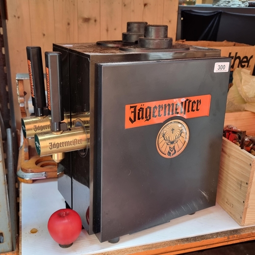 300 - A very sleek 'Jagermeister' dual tap shot machine with option for cold brew coffee.