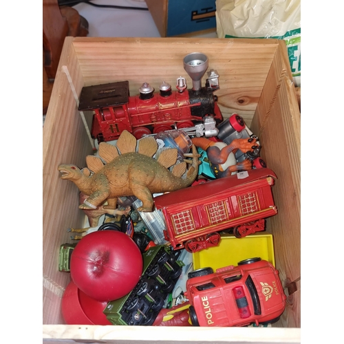 301 - A wooden box containing a variety of wonderful children's toys including examples such as Harry Pott... 