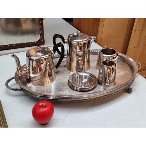 306 - A large footed platter along with Henry Jenkins EPNS coffee and teapot, Henry Jenkins milk jug and t... 