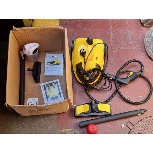 314 - A 'Little Yellow' Steam cleaner, Model No 2UK15. In great condition and includes manual and accessor... 