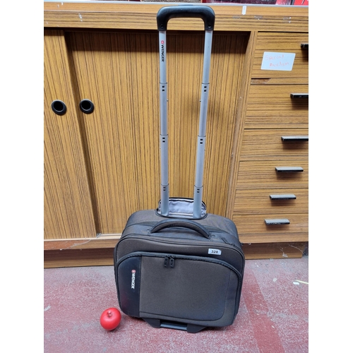 328 - A Wenger laptop trolley bag with three main compartments. Wenger trolley bags retailing for €140+ on... 