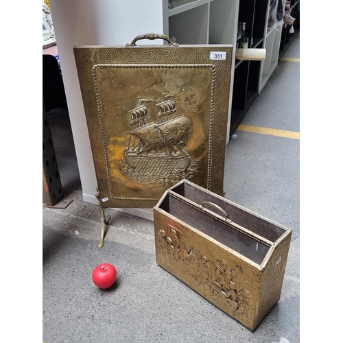 331 - Two hammered brass items including a magazine holder and a fire screen.