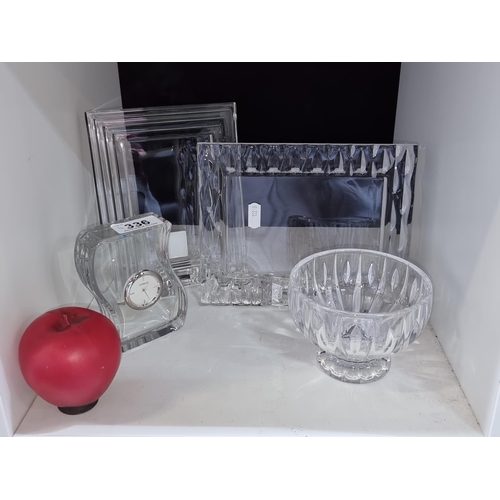 336 - Four Marquis by Waterford Crystal items including a desk clock, two frames and a pedestal bowl.