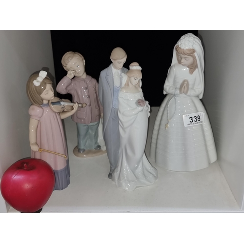 339 - Four very pretty pieces of Nao Spanish made porcelain figures. All in every good condition