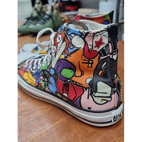 745 - A pair of brand new Converse All Star high-top sneakers in a graffiti print. UK size 10. Very cool.