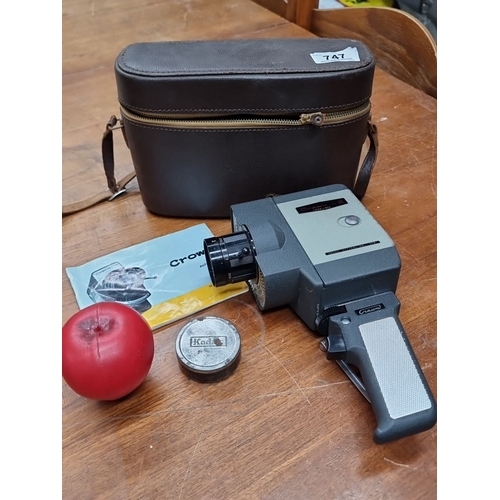 747 - A vintage Crown 8mm Cine Camera, model 8, with original leather case and instruction manual. Serial ... 