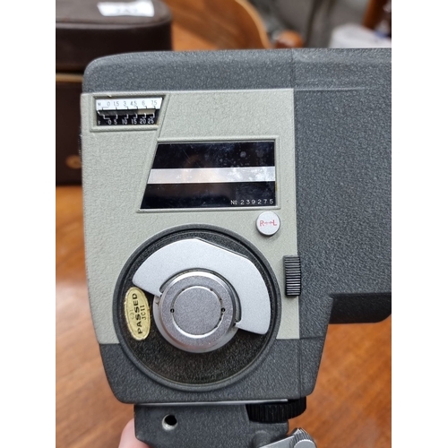 747 - A vintage Crown 8mm Cine Camera, model 8, with original leather case and instruction manual. Serial ... 