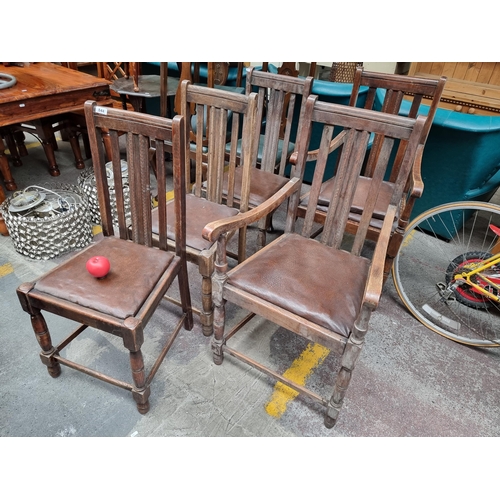 844 - Five antique oak dining chairs including two dining armchairs. All chairs feature hand carved detail... 