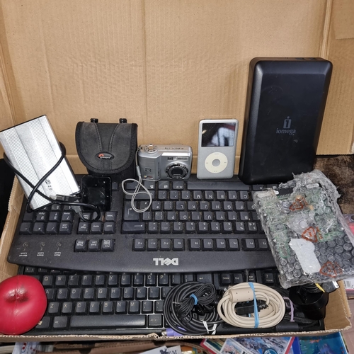 823 - A box containing a HP Keyboard, a DELL Keyboard and a Kodak EasyShare C360. Along with a white box c... 