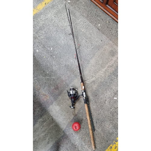 831 - A high quality 'Quick Silver' sea fishing rod supplied with a 'Mitchell' reel.