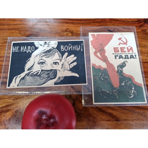 948 - Two Soviet WWII propaganda postcards, depicting anti-war and anti-fascist themes.  Each card measure... 