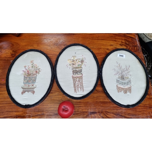 949 - Set of three vintage embroidered floral art pieces in oval frames, featuring intricately designed pl... 