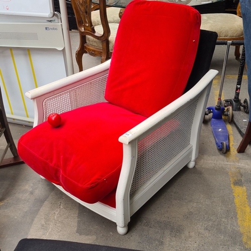 969 - Vintage white-painted armchair with red and black upholstery. Featuring stylish caned sides and back... 