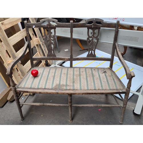 971 - Early 20th Century wooden bench with a carved backrest and upholstered seat in striped fabric. Vinta... 