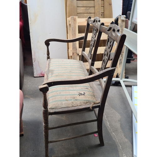 971 - Early 20th Century wooden bench with a carved backrest and upholstered seat in striped fabric. Vinta... 