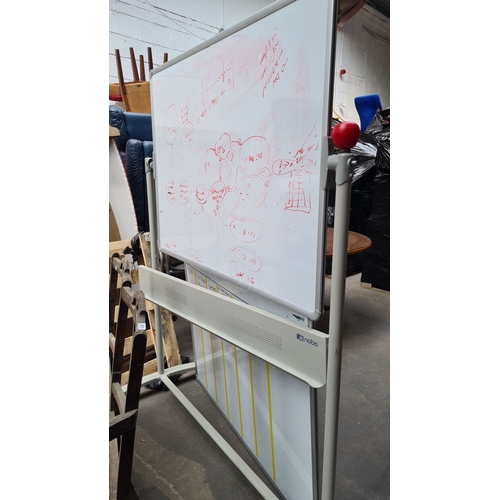 987 - Pair of mobile double-sided whiteboards on wheels. Brand: Nobo. Ideal for office or classroom use.