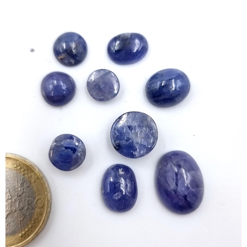 913 - A packet of gorgeous Cabochon Tanzanite gemstones. 36.7 cts. Beautiful purple light dancing gem ston... 