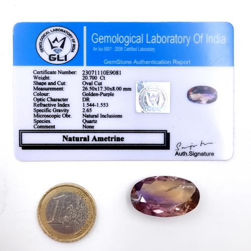 921 - A natural Ametrine stone of cabochon cut (Carat weight - 20.7). Comes with graded certificate of aut... 