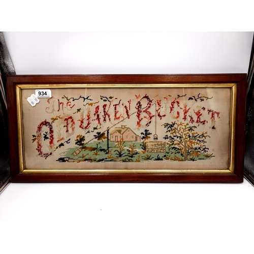 934 - A lovely vintage 'The Old Oaken Bucket' framed cross stitch tapestry. Housed in wooden gilt frame be... 