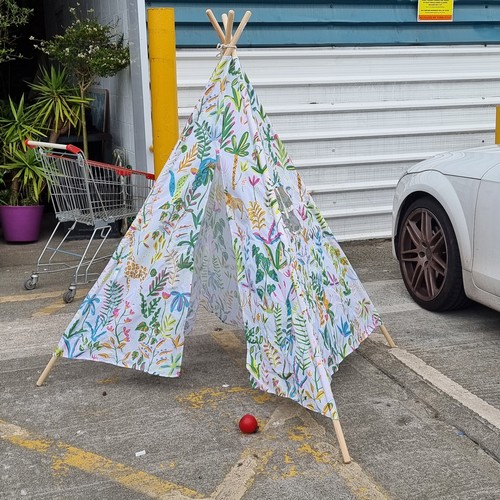 839 - A sweet children's play tent / teepee featuring animal themed patterns in colourful children's colou... 