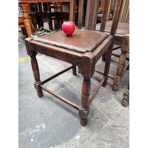 844 - Five antique oak dining chairs including two dining armchairs. All chairs feature hand carved detail... 