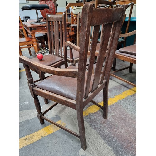 844 - Five antique oak dining chairs including two dining armchairs. All chairs feature hand carved detail... 