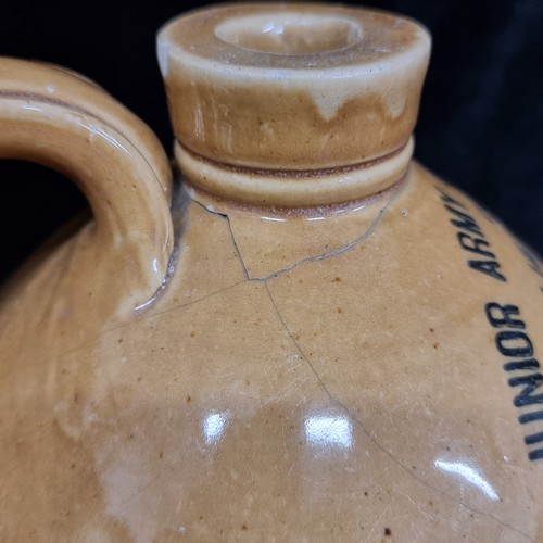 191 - A fantastic Junior Army & Navy Stores Ltd of D'Oliver Street Dublin stoneware flagon. In good order.... 