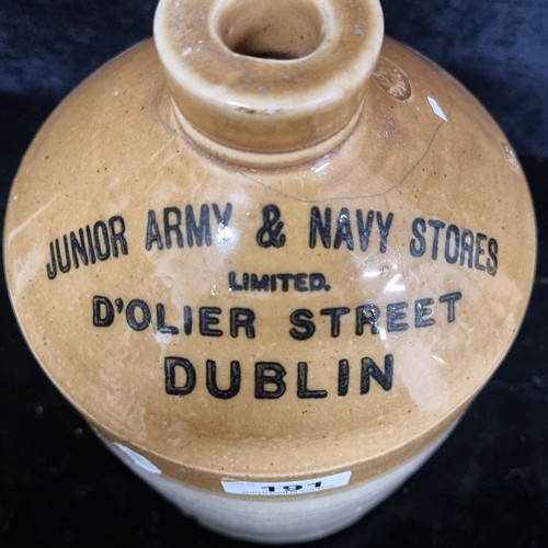 191 - A fantastic Junior Army & Navy Stores Ltd of D'Oliver Street Dublin stoneware flagon. In good order.... 