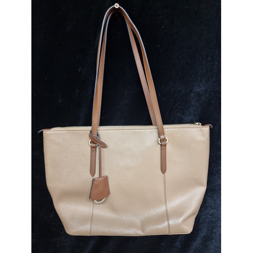 262 - A Radley London ladies tan leather handbag. RRP for similar models on website £199+ with original du... 