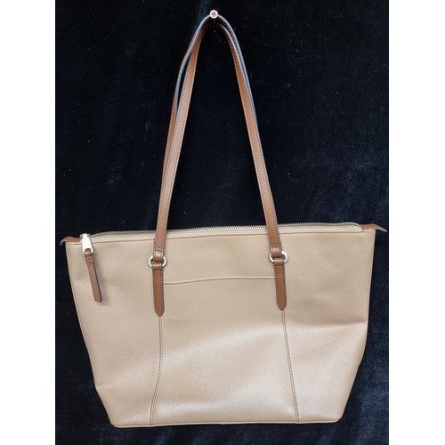 262 - A Radley London ladies tan leather handbag. RRP for similar models on website £199+ with original du... 