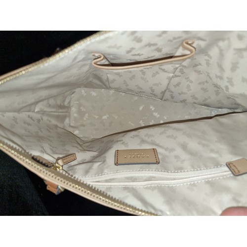 262 - A Radley London ladies tan leather handbag. RRP for similar models on website £199+ with original du... 