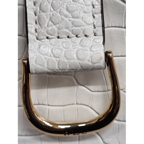 272 - A nice example of a ladies leather Lauren by Ralph Lauren white leather cross body bag with original... 