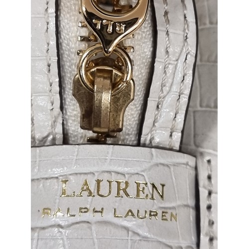 272 - A nice example of a ladies leather Lauren by Ralph Lauren white leather cross body bag with original... 