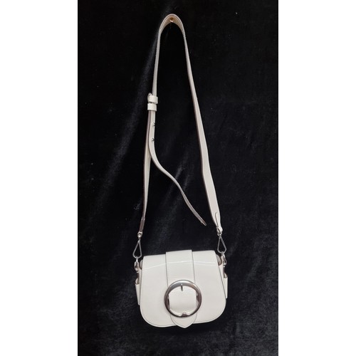 275 - Star Lot : A fab Polo Ralph Lauren ladies 'Lennox' cross body white patent leather bag. Concealed ma... 