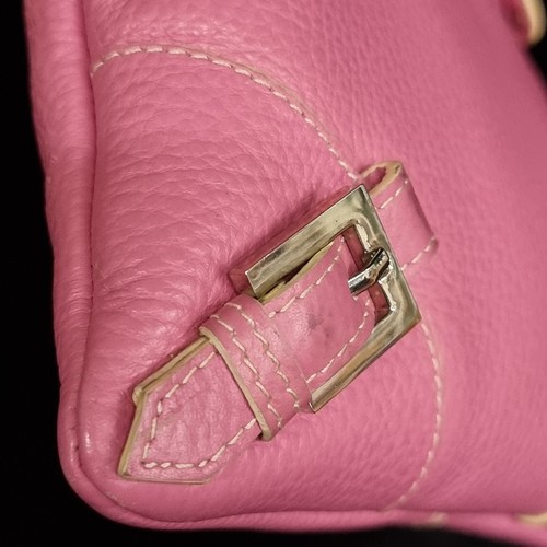 277 - A Jane Shilton genuine leather small crossbody messenger bag. Pink leather with a cream strap. In ve... 