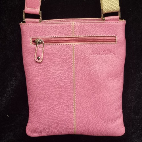 277 - A Jane Shilton genuine leather small crossbody messenger bag. Pink leather with a cream strap. In ve... 