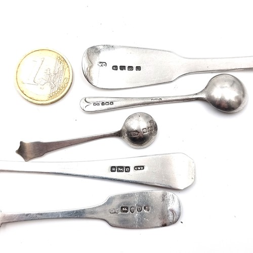 12 - A collection of spoons consisting of a bright cut example hallmarked Sheffield. Together with an Iri... 