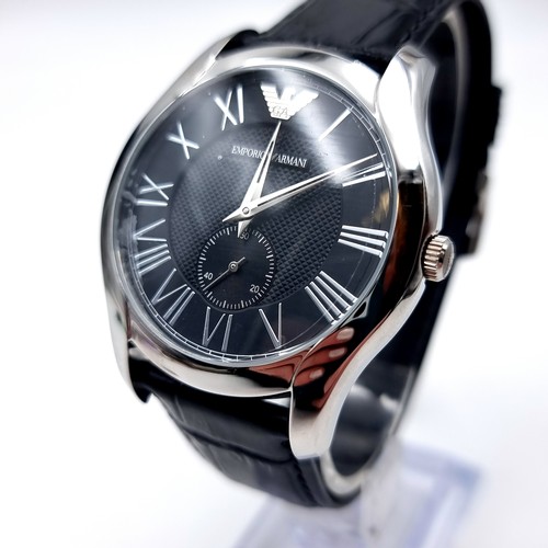 30 - Star Lot : A Swiss made  gents Emporio Armani wristwatch in As new condition set with roman numeral ... 