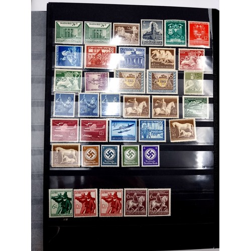 933 - A fascinating vintage stamp album comprising of German stamps. 80% full. Very good album