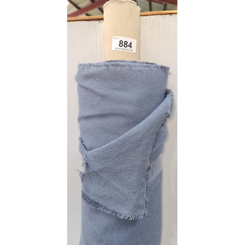 884 - A roll of blue-grey fabric for furniture reupholstery.