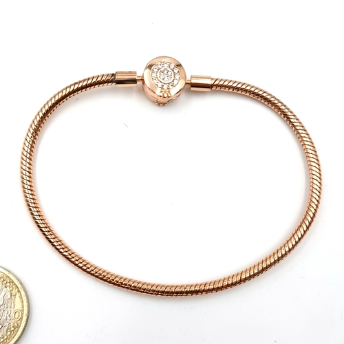12 - A silver gilt  bracelet. Diameter - 7 cms. Weight - 13 grams. Old new stock.