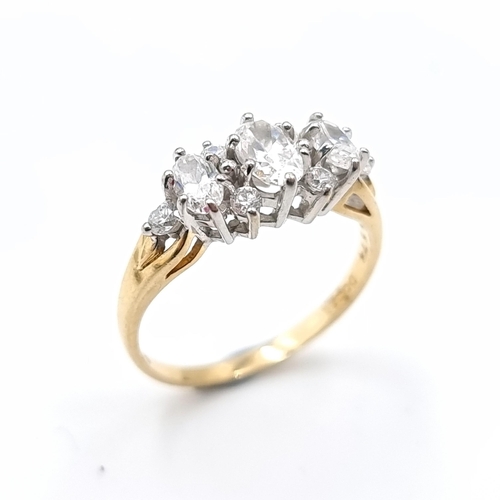 14 - A 14 carat gold gem set cluster ring. Ring size - P. Weight - 2.93 grams.